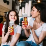 customized baltimore orioles winnie the pooh orange gray skinny tumbler best selling.webp