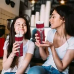 customized cincinnati reds sparkle drip red skinny tumbler best selling 1.webp