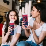 customized los angeles angels kiss band red skinny tumbler best selling.webp