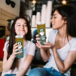 customized oakland athletics snoopy attitude green skinny tumbler best selling.webp