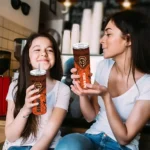 customized san francisco giants spiral burst print orange skinny tumbler best selling.webp