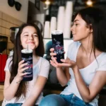 personalized atlanta braves rose romance navy black skinny tumbler best selling.webp