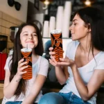 personalized baltimore orioles camo texture orange skinny tumbler best selling 1.webp