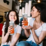 personalized baltimore orioles swirl texture orange skinny tumbler best selling.webp