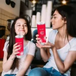 personalized cincinnati reds starburst tiles red skinny tumbler best selling.webp