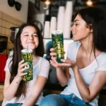 personalized oakland athletics metallic grid green skinny tumbler best selling.webp